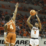 Carr, tough defense push No. 6 Texas past Oklahoma St. 56-46