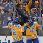 Thomas scores in OT, Blues rally past Flames 4-3