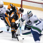 Malkin's 4-point game fuels rally as Pens top Canucks 5-4