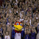 Adams scores late, No. 2 Kansas edges No. 14 Iowa St 62-60