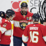 Panthers score 3 in 2nd period, rally to beat Canucks 4-3
