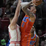 Butler, Heat set NBA free throw record, beat OKC 112-111
