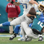 Jags QB Lawrence makes playoff history with 4 1st-half picks