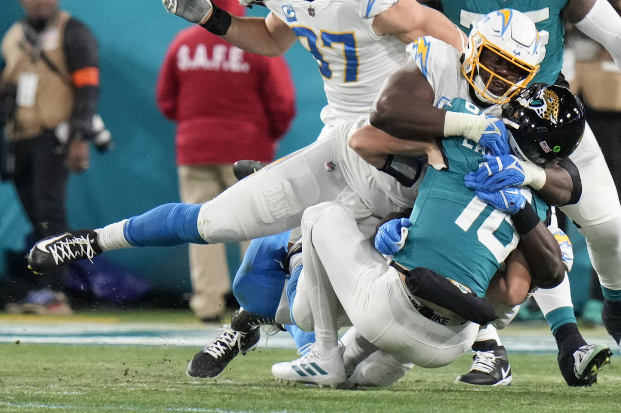 Los Angeles Chargers defensive tackle Sebastian Joseph-Day (69) sacks Jacksonville Jaguars quarterb...