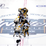 DeBrusk scores 2 in 3rd, Bruins beat Pens in Winter Classic