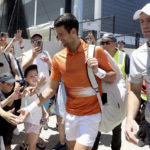 Djokovic gets warm welcome in doubles loss at Adelaide
