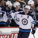 Scheifele scores twice as Jets race by Penguins 4-1