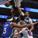 Doncic scores 53 in return, Mavericks beat Pistons 111-105
