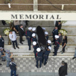 Pelé buried at cemetery in Brazilian city he made famous