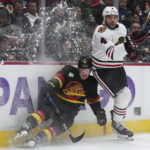 Canucks beat Blackhawks 5-2 in Tocchet's debut as coach