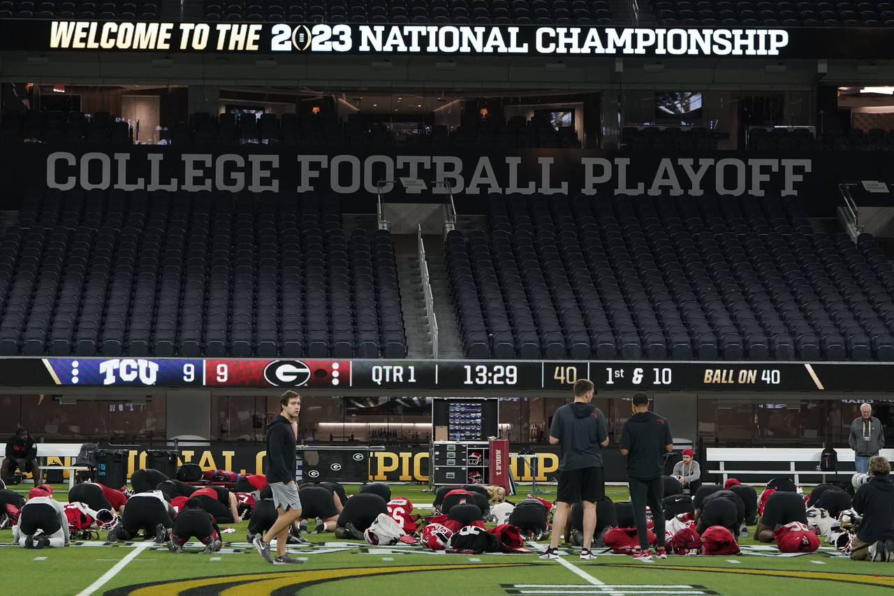 Georgia players work out during practice inside SoFi Stadium ahead of the national championship NCA...