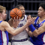 Johnson scores 24 as No. 13 K-State beats No. 2 Kansas 83-82