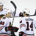 Stauber wins again, Blackhawks beat Flames 5-1