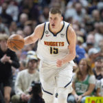 Jokic has triple-double, Nuggets top Celtics after rim delay