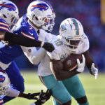 Bills hang on for 34-31 wild-card win over Dolphins
