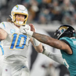 Lawrence rallies Jaguars from 27 down to beat Chargers 31-30