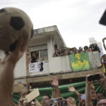 Pelé buried at cemetery in Brazilian city he made famous