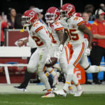 Mahomes sets record, Chiefs beat Raiders for AFC's top seed