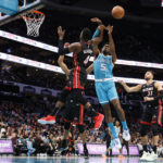 Rozier, Washington help Hornets rally past Heat 122-117