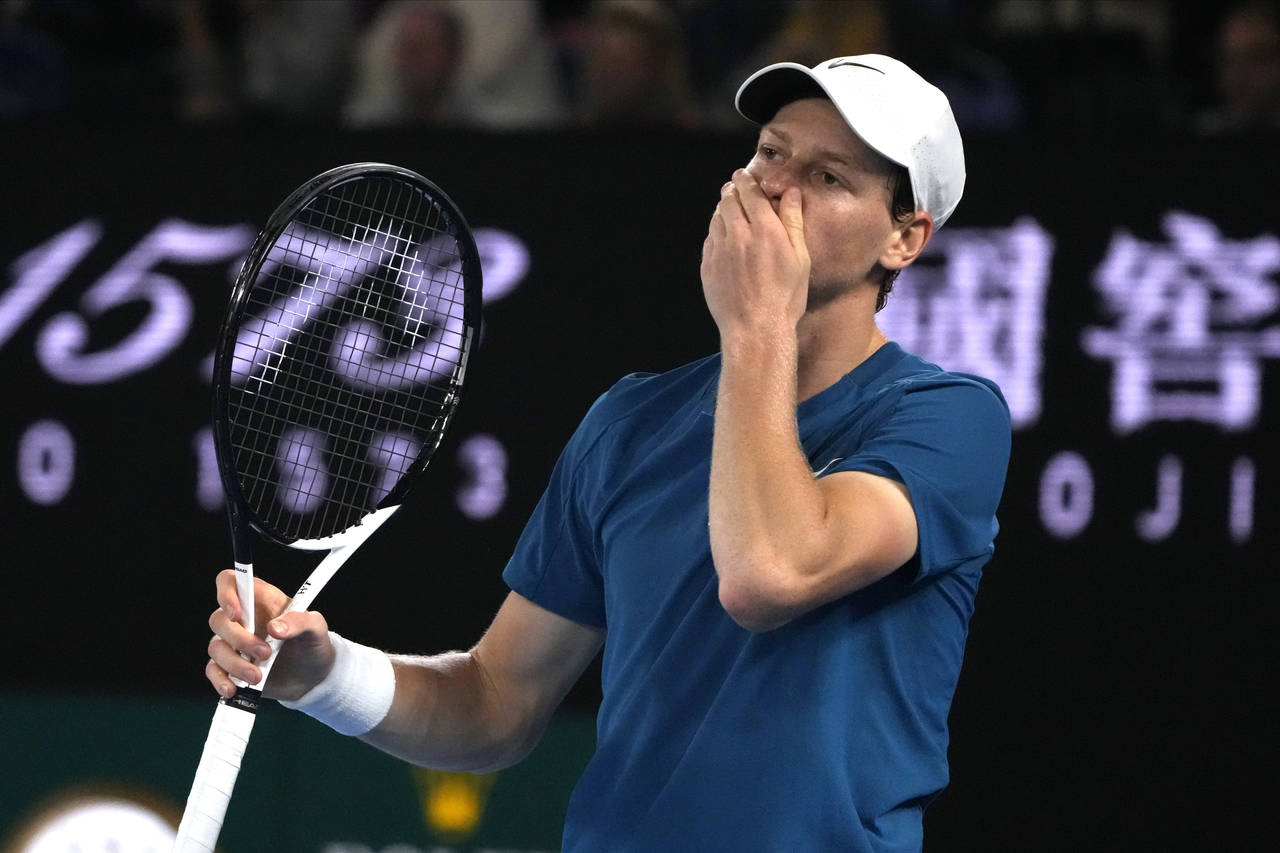 Jannik Sinner of Italy reacts during his fourth round match against Stefanos Tsitsipas of Greece at...