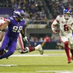Giants outlast Vikings 31-24 for 1st playoff win in 11 years