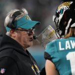 Jags QB Lawrence makes playoff history with 4 1st-half picks