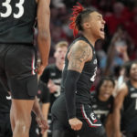 Walker, No. 3 Houston rally for a 75-69 win over Cincinnati