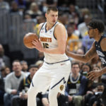 Jokic's late 3 lifts Nuggets past Magic 119-116