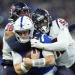 Texans rally for 32-31 win at Indy but lose top draft pick