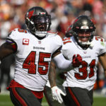 Brady, Bucs rally to beat Panthers 30-24, clinch NFC South