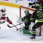 Hughes scores winner in OT to lead Devils past Stars 3-2