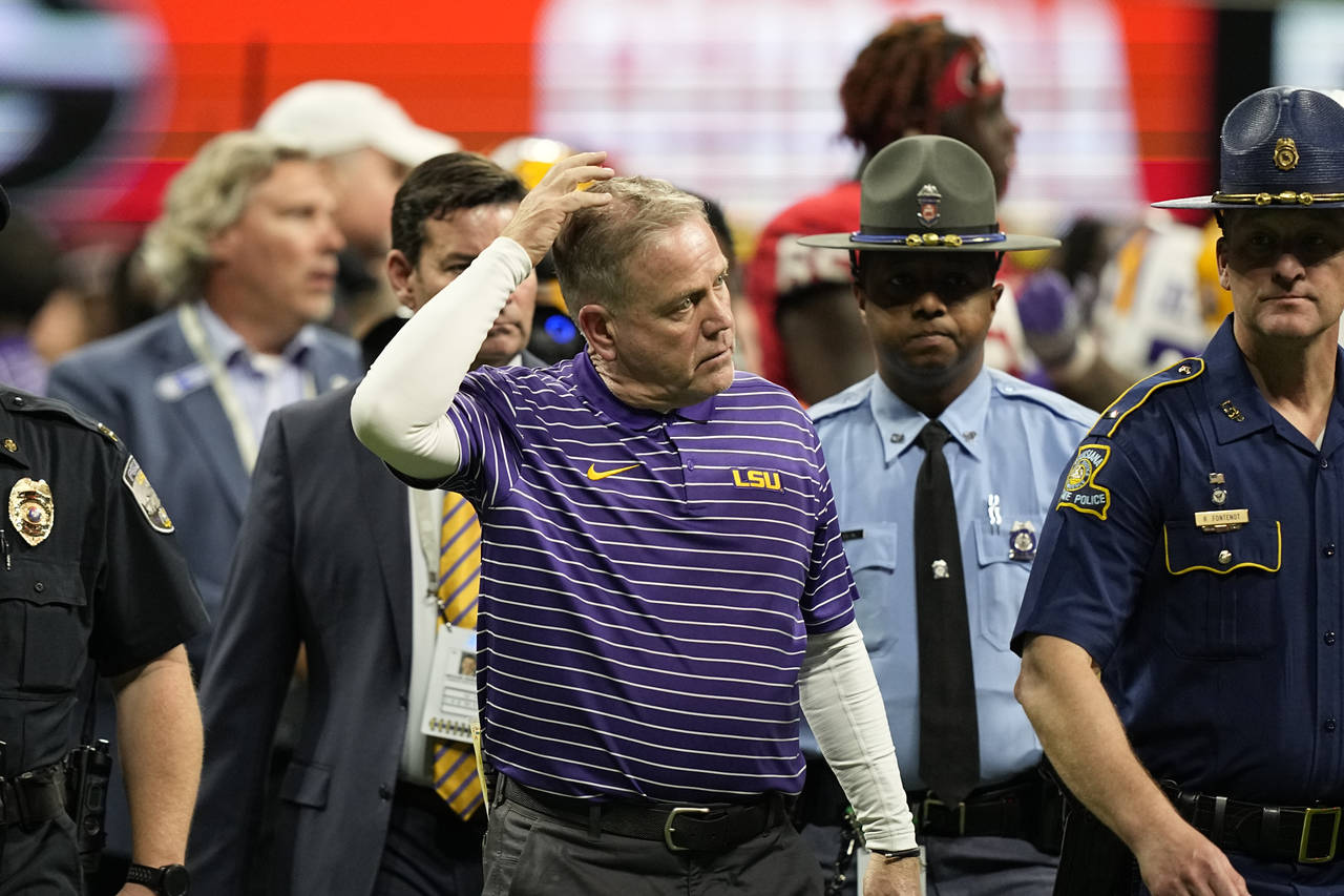 LSU head coach Brian Kelly walks off the field after a loss at the Southeastern Conference champion...