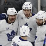Grzelcyk breaks tie late, Bruins beat Maple Leafs 4-3