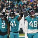 Jags return fumble for TD, beat Titans for AFC South title
