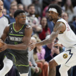 Murray, Jokic help Nuggets rally past Timberwolves 122-118