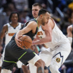 Murray, Jokic help Nuggets rally past Timberwolves 122-118