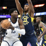 Grizzlies use Morant's triple-double, rally to beat Pacers