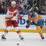 Thomas scores in OT, Blues rally past Flames 4-3