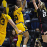 Brink's big day helps No. 2 Stanford hold off Cal 60-56