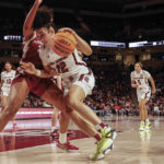 Boston's sets record, No. 1 Gamecocks top Arkansas 92-46
