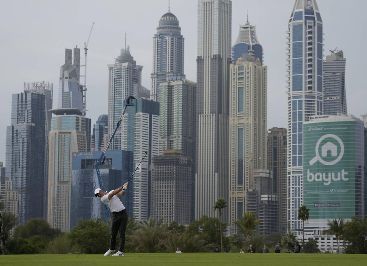 Rory McIlroy of Northern Ireland plays his second shot on the 13th hole during the first round of t...