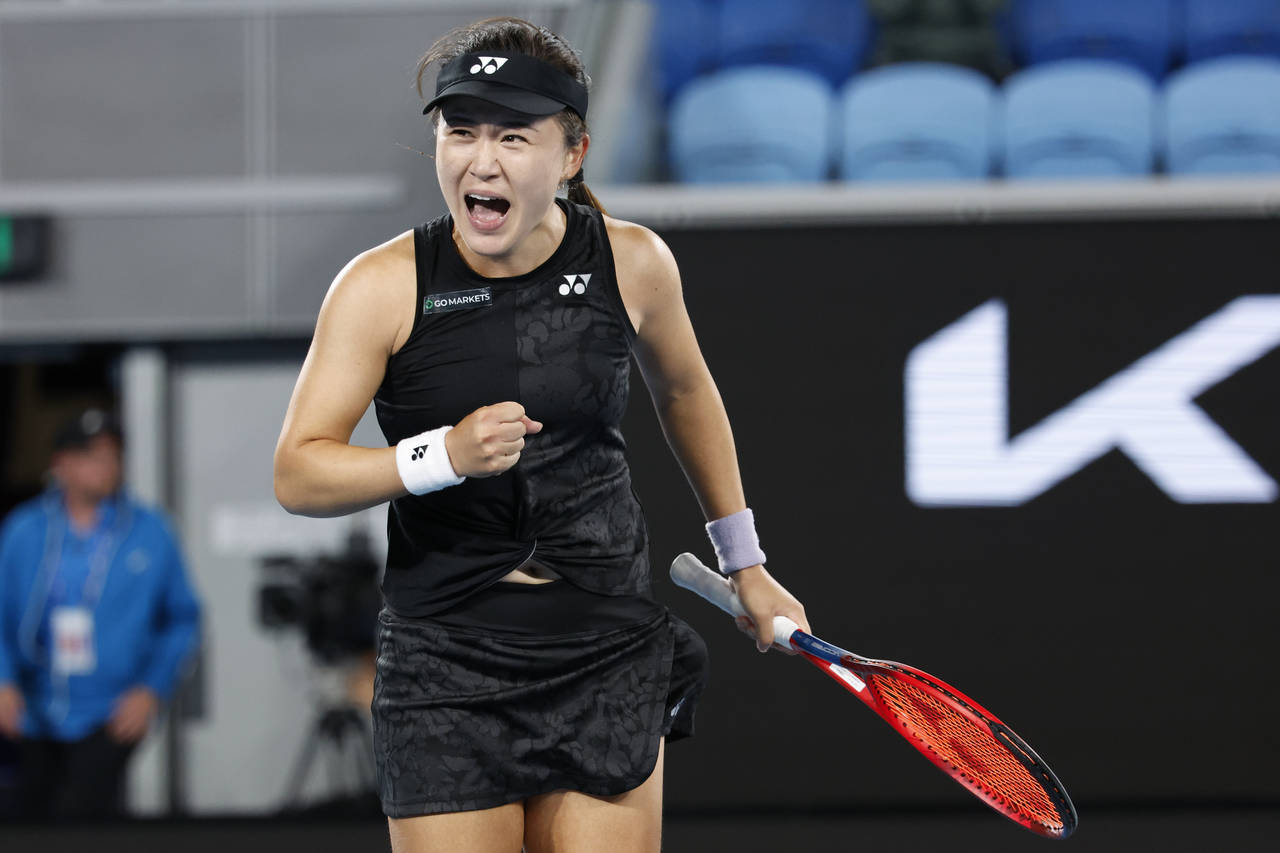 Zhu Lin of China celebrates after defeating Maria Sakkari of Greece in their third round match at t...