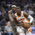 Hunter, Collins star as Hawks beat Kings 120-117