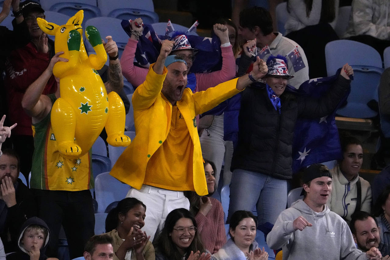 Supporters cheer during a match between Andy Murray of Britain and Thanasi Kokkinakis of Australia ...