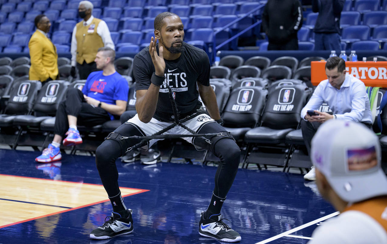 Brooklyn Nets forward Kevin Durant warms up before an NBA basketball game against the New Orleans P...