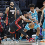Rozier, Washington help Hornets rally past Heat 122-117
