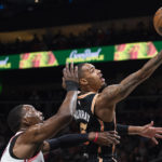 Murray's 28 help hot-shooting Hawks hold off Heat, 121-113