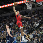 Russell scores 16 points in 4th, Wolves beat Raptors 128-126