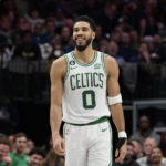 Tatum's rare triple-double leads Celtics past Mavs, 124-95
