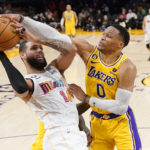 Schröder propels Lakers past Heat 113-109 without LeBron, AD